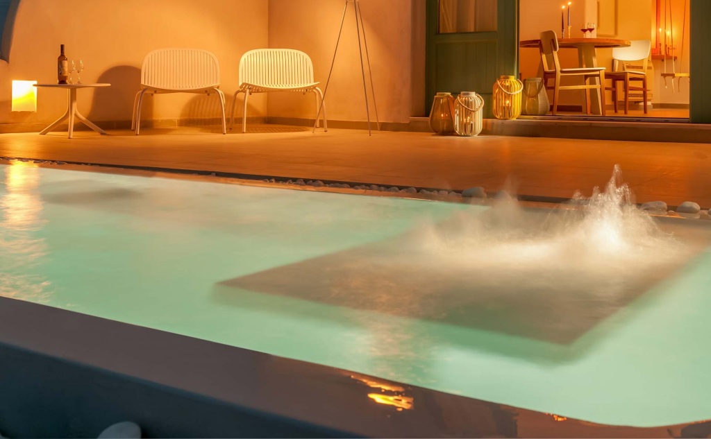 Outdoor heated spa suite swimming pool, Neptune Luxury Spa Suites, Santorini, Greece