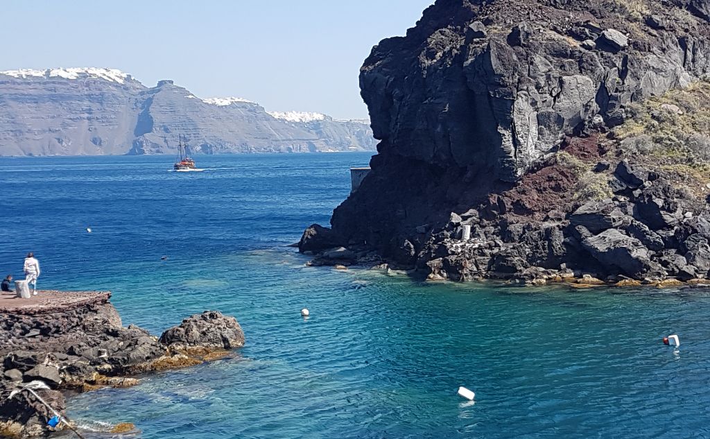Diving and snorkeling happens at Amoudi Bay year-round, Oia, Santorini, Greece