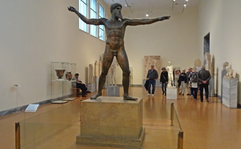 Zane Statue Visiting The Ancient Olympic Stadium In Greece | Take Me To Greece