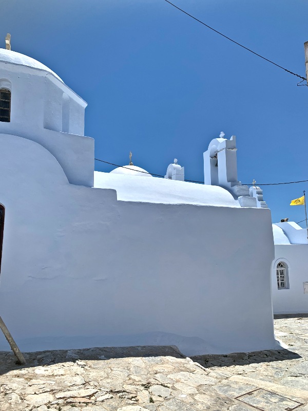 Church of Ascension and Annunciation of Virgin Mary with Amorgos Cathedral behind